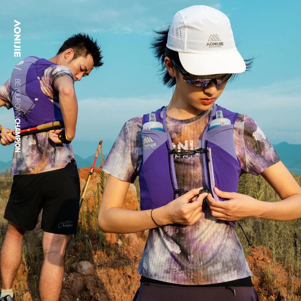 AONIJIE CHALECO DE HIDRATACION MB 12LITROS MORADO